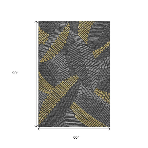 HomeRoots 5' X 8' Gray Gold and Black Botanical Leaves Rug - Washable, UV Protected, Stylish & Durable Decor 645008