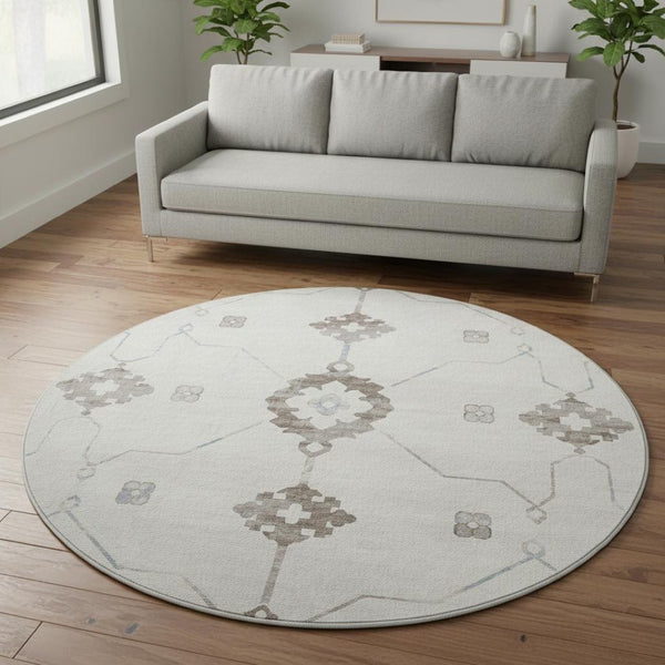 HomeRoots 8' Stylish Taupe & Ivory Floral Medallion Washable Round Rug with UV Defense for Every Space 645112