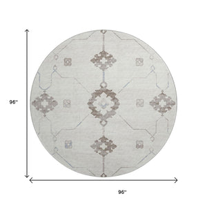HomeRoots 8' Stylish Taupe & Ivory Floral Medallion Washable Round Rug with UV Defense for Every Space 645112