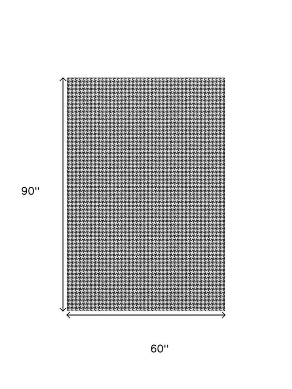 HomeRoots 5' X 8' Black And White Houndstooth Area Rug - Washable, UV Protected, Perfect for High-Traffic Spaces 645171