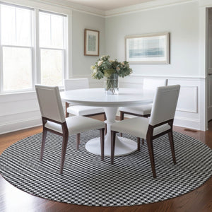 HomeRoots 8' Black And White Houndstooth Round Rug - Washable, UV Protected, Durable for High-Traffic Areas 645172