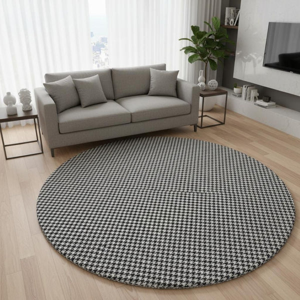 HomeRoots 8' Black And White Houndstooth Round Rug - Washable, UV Protected, Durable for High-Traffic Areas 645172