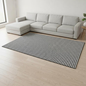 HomeRoots 10' Stylish Black and White Houndstooth Area Rug - Washable, UV Protected, Perfect for High-Traffic Spaces 645175
