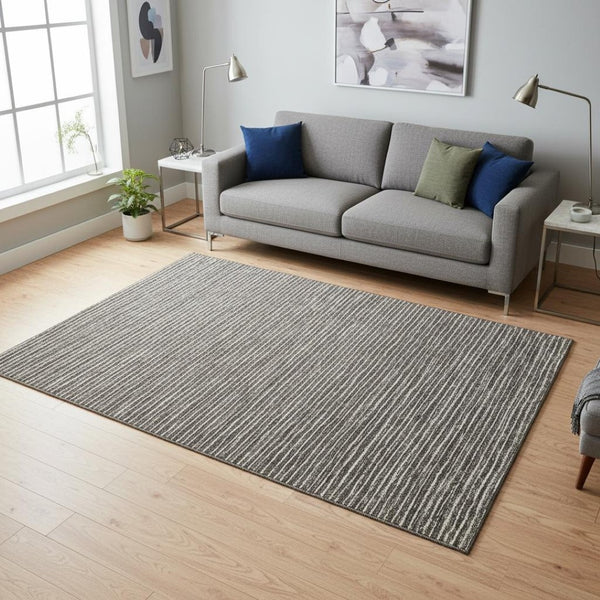 HomeRoots 5' X 8' Chocolate and Ivory Striped Washable Area Rug - Durable, UV-Protected, Pet-Friendly Design 645195