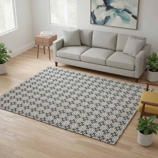 HomeRoots 5' X 8' Black and Ivory Geometric Area Rug - Washable, UV Protected, Durable for High Traffic Homes 645255