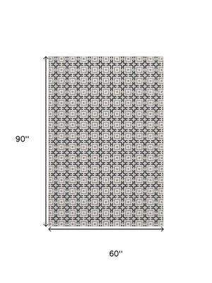 HomeRoots 5' X 8' Black and Ivory Geometric Area Rug - Washable, UV Protected, Durable for High Traffic Homes 645255