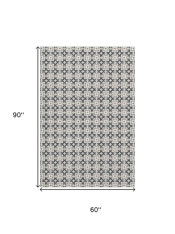 HomeRoots 5' X 8' Black and Ivory Geometric Area Rug - Washable, UV Protected, Durable for High Traffic Homes 645255