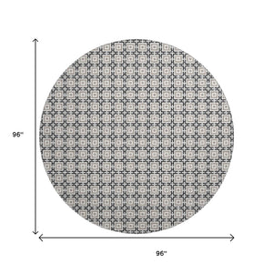 HomeRoots 8' Black and Ivory Geometric Round Rug - Washable, UV Protected, Kid & Pet Friendly for Stylish Spaces 645256