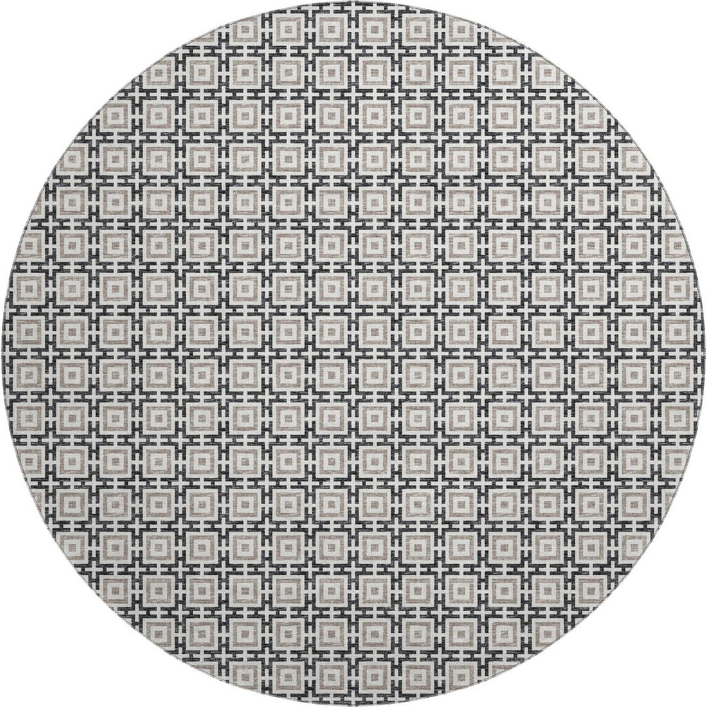 HomeRoots 8' Black and Ivory Geometric Round Rug - Washable, UV Protected, Kid & Pet Friendly for Stylish Spaces 645256