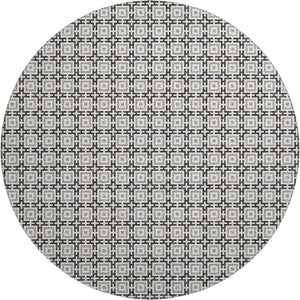HomeRoots 8' Black and Ivory Geometric Round Rug - Washable, UV Protected, Kid & Pet Friendly for Stylish Spaces 645256