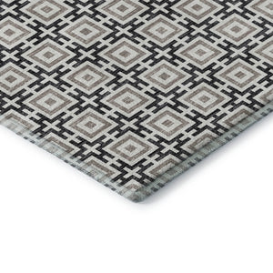 HomeRoots 8' Black and Ivory Geometric Round Rug - Washable, UV Protected, Kid & Pet Friendly for Stylish Spaces 645256