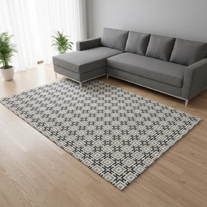 HomeRoots 8' X 10' Black And Ivory Geometric Area Rug - Washable, UV Protected, Stain Resistant, Durable Design 645257