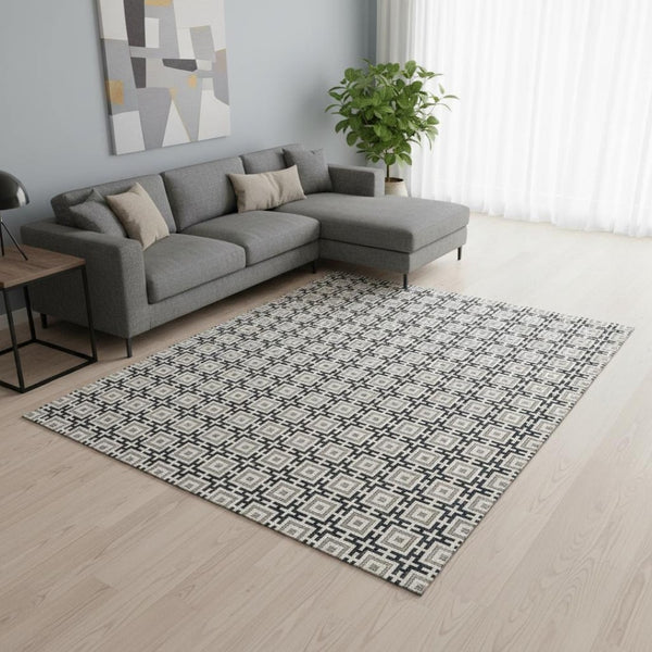 HomeRoots 9' X 12' Modern Black and Ivory Geometric Area Rug - Washable, Stain Resistant, UV Protected Design 645258