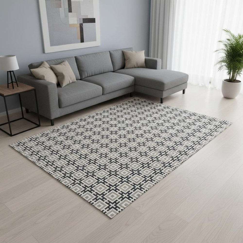 HomeRoots 10' X 14' Black and Ivory Geometric Area Rug - Washable, UV Protected, Perfect for Busy Homes! 645259