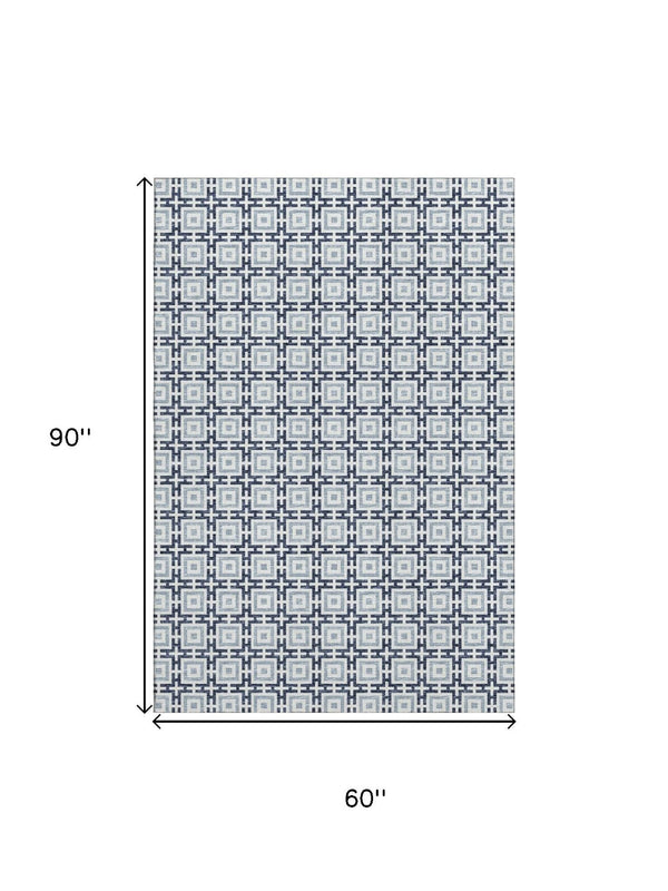 HomeRoots 5' X 8' Navy Blue and Ivory Geometric Area Rug - Machine Washable, UV Protected for Modern Homes 645267