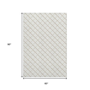 HomeRoots 5' X 8' Ivory and Taupe Geometric Area Rug - Washable, UV Protected, Stain Resistant for Modern Spaces 645279