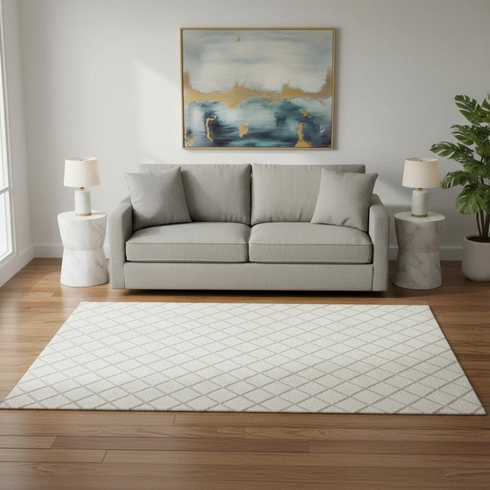 HomeRoots 5' X 8' Ivory and Taupe Geometric Area Rug - Washable, UV Protected, Stain Resistant for Modern Spaces 645279