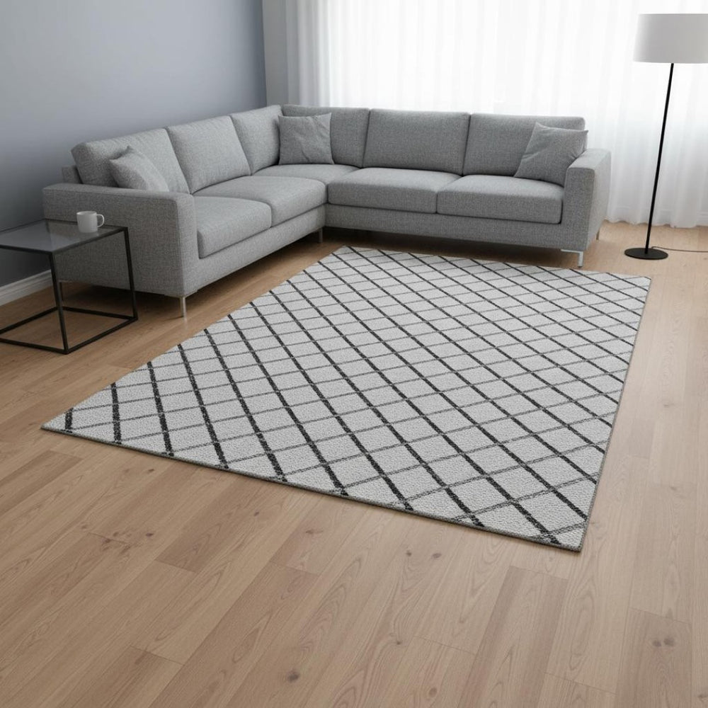 HomeRoots 10' X 14' Stylish Gray and Black Geometric Washable Area Rug with UV Protection for Modern Spaces 645319