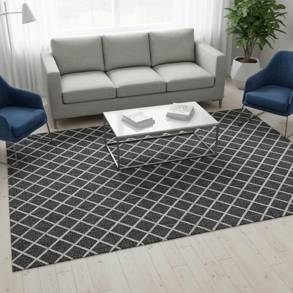 HomeRoots 5' X 8' Black And Ivory Geometric Area Rug - Washable, Stain-Resistant, UV Protected Design for Homes 645321