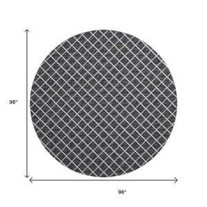 HomeRoots 8' Black and Ivory Geometric Round Rug - Washable, UV-Protected, Durable Design for Busy Homes 645322