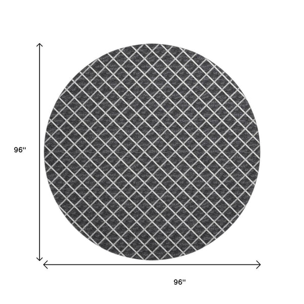 HomeRoots 8' Black and Ivory Geometric Round Rug - Washable, UV-Protected, Durable Design for Busy Homes 645322