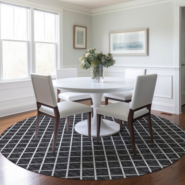 HomeRoots 8' Black and Ivory Geometric Round Rug - Washable, UV-Protected, Durable Design for Busy Homes 645322