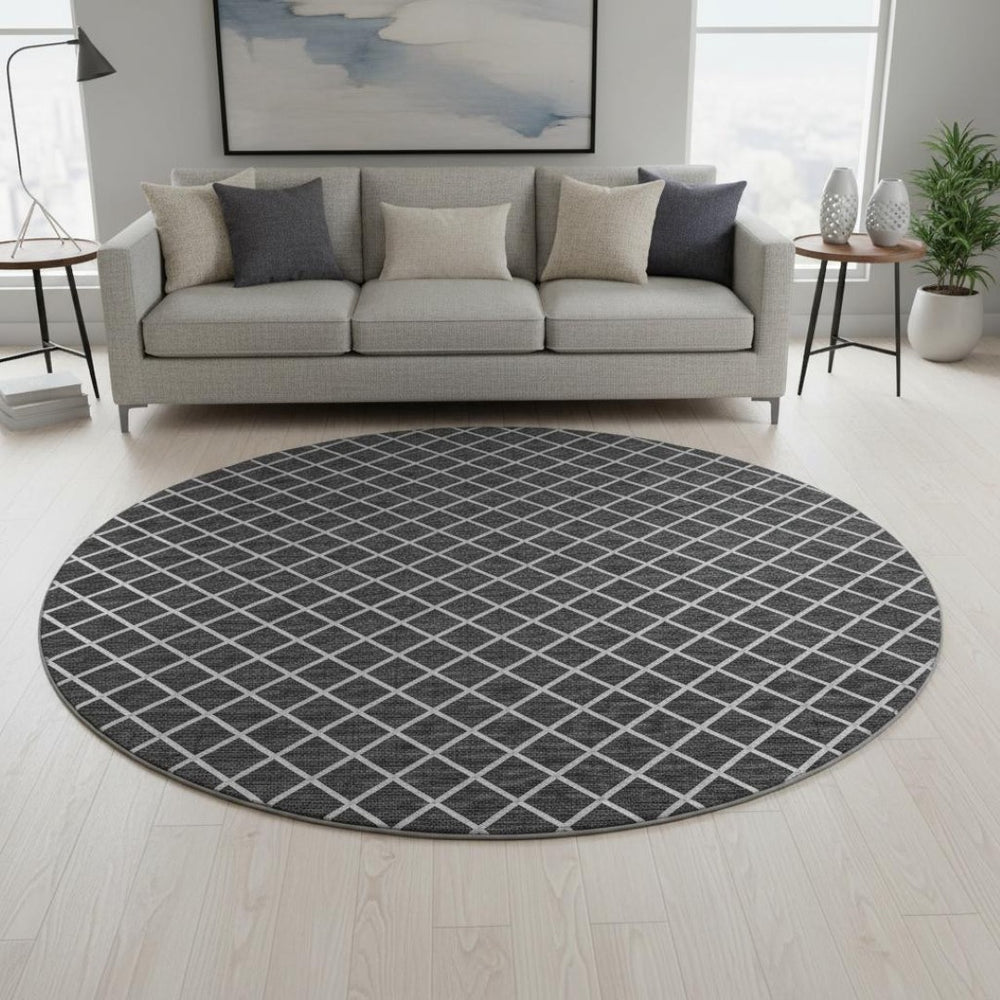 HomeRoots 8' Black and Ivory Geometric Round Rug - Washable, UV-Protected, Durable Design for Busy Homes 645322