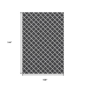HomeRoots 9' X 12' Black And Ivory Geometric Area Rug - Machine Washable, UV Resistant, Perfect for Families! 645324
