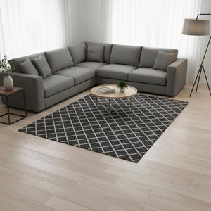 HomeRoots 10' X 14' Black And Ivory Geometric Area Rug - Durable, Washable, UV Protected for Modern Homes 645325