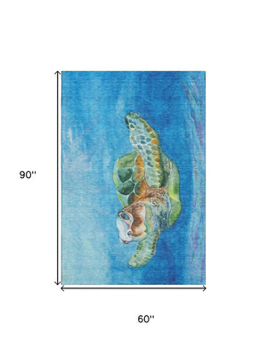 HomeRoots 5' X 8' Nautical Area Rug in Pacific Blue, Emerald & Beige – Washable, UV Protected & Stain Resistant! 645369