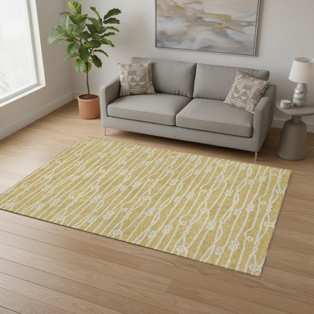 HomeRoots 5' X 8' Coastal Nautical Area Rug in Gold and Ivory - Washable, UV Protected, Ideal for Homes with Kids! 645393