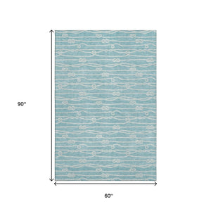 HomeRoots 5' X 8' Teal Blue Nautical Area Rug - Washable, Stain-Resistant, UV Protected for High-Traffic Spaces 645399