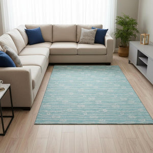 HomeRoots 10' Teal Blue and Ivory Nautical Area Rug - Washable, UV-Protected, Stain-Resistant Charm for Homes 645403