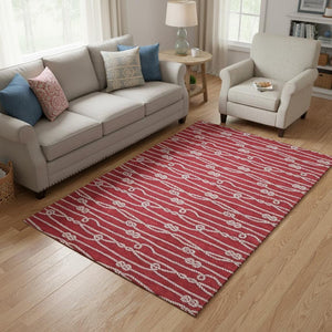 HomeRoots 5' X 8' Red and Ivory Nautical Area Rug - Durable, Washable, UV Protected for Coastal Living Spaces 645405