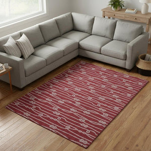 HomeRoots 9' X 12' Nautical Red and Ivory Washable Area Rug with UV Protection for Coastal-Inspired Décor 645408
