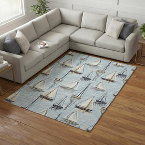 HomeRoots 10' X 14' Coastal Nautical Area Rug in Sky Blue, Gold & Ivory - Washable, UV-Protected, Durable Design 645427