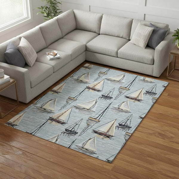 HomeRoots 10' X 14' Coastal Nautical Area Rug in Sky Blue, Gold & Ivory - Washable, UV-Protected, Durable Design 645427