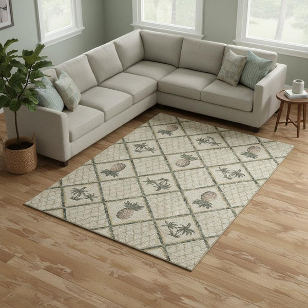 HomeRoots 9' x 12' Botanical Leaves Area Rug in Beige Gold Gray - Washable, UV Protected, Durable Style 645510