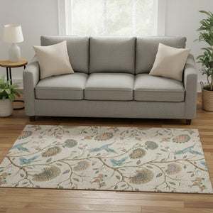 HomeRoots 5' X 8' Geometric Washable Area Rug in Beige, Blue & Peach – UV Protected & Kid-Friendly Design! 645579