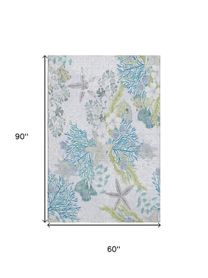 HomeRoots 5' X 8' Aqua Ivory Green Geometric Washable Area Rug - UV Protected, Stain Resistant & Stylish Decor 645692