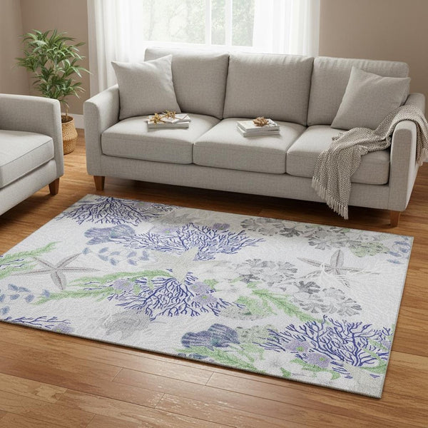 HomeRoots 5' X 8' Washable Geometric Area Rug in Blue, Ivory & Lime Green - UV Protected for High Traffic Use 645710