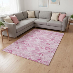 HomeRoots 10' Pink and Ivory Geometric Area Rug - Washable, UV Protected, Perfect for Family Rooms & Patios 645720