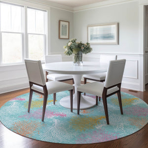 HomeRoots 8' Vibrant Aqua, Orange & Pink Geometric Washable Round Rug with UV Protection for Any Space 645741