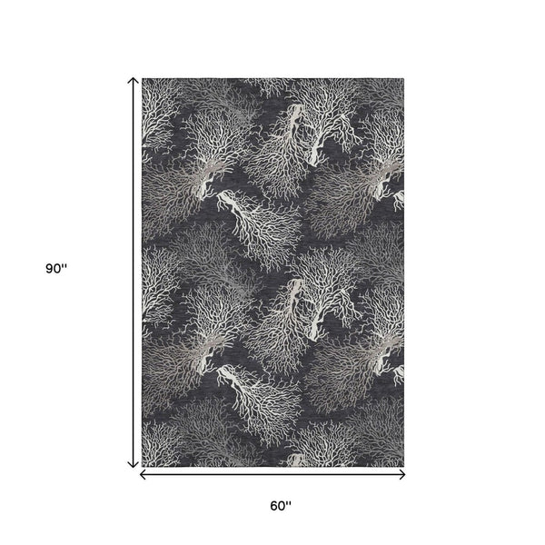 HomeRoots 5' X 8' Stylish Midnight and White Geometric Area Rug - Washable, UV Protected, Durable Design! 645758