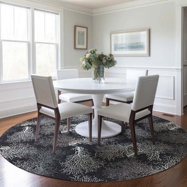 HomeRoots 8' Midnight and White Geometric Round Rug - Washable, UV Protected, Stylish for High-Traffic Areas 645759