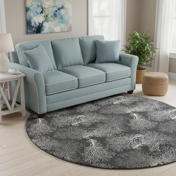 HomeRoots 8' Midnight and White Geometric Round Rug - Washable, UV Protected, Stylish for High-Traffic Areas 645759