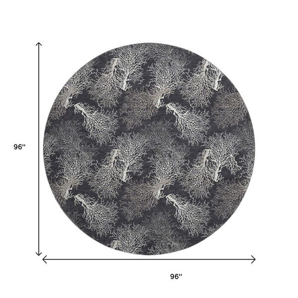 HomeRoots 8' Midnight and White Geometric Round Rug - Washable, UV Protected, Stylish for High-Traffic Areas 645759