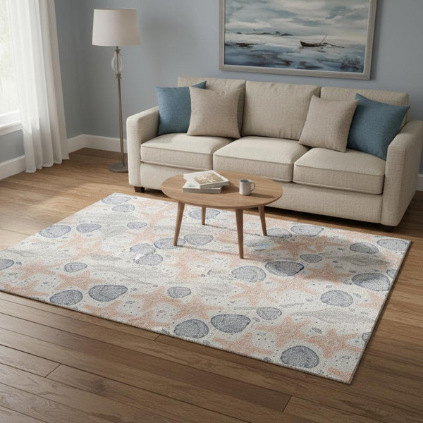 HomeRoots 5' X 8' Stylish Peach Ivory & Navy Blue Geometric Washable Area Rug with UV Protection for Homes 645764