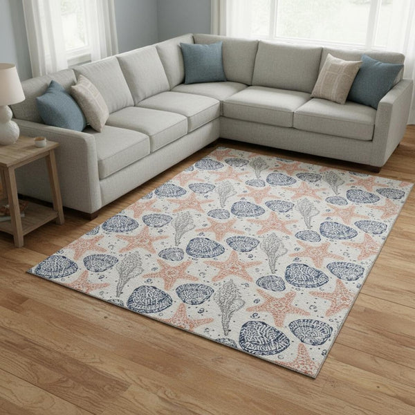 HomeRoots 9' X 12' Stylish Peach & Navy Geometric Area Rug - Washable, UV-Protected, Durable for High Traffic Areas 645767