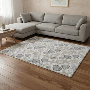 HomeRoots 9' X 12' Light Gray & Charcoal Geometric Washable Area Rug with UV Protection for Modern Spaces 645779